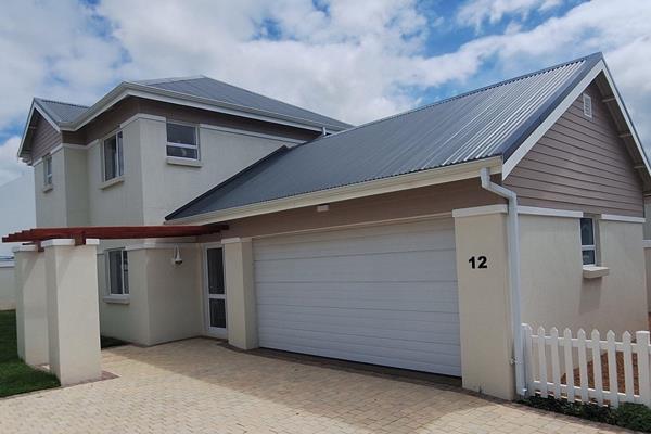 Situated in the sought-after coastal town of Jeffreys Bay, this stunning 3-bedroom ...