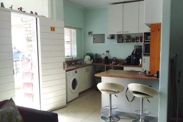 This charming 2-bedroom apartment
 is tiled throughout which offers lots of natural ...