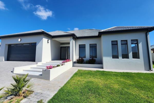 Step into modern elegance with this newly built gem, perfectly positioned in the ...