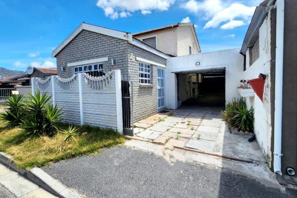 Welcome to a charming three-bedroom home, features a cozy lounge with fully tiled floors, creating a welcoming atmosphere that flows ...