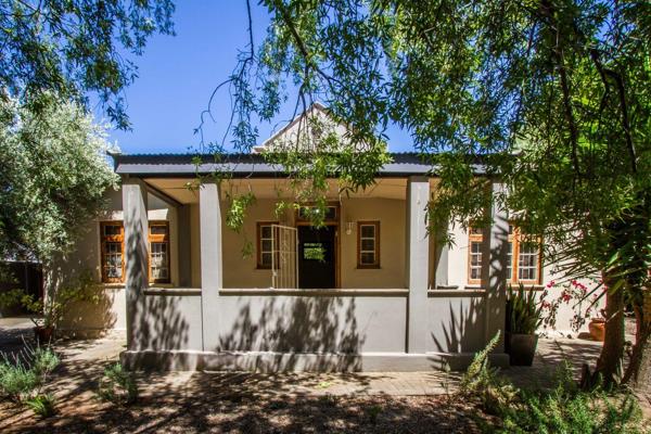 This charming 3-bedroom, 2-bathroom home seamlessly blends old-world character with ...