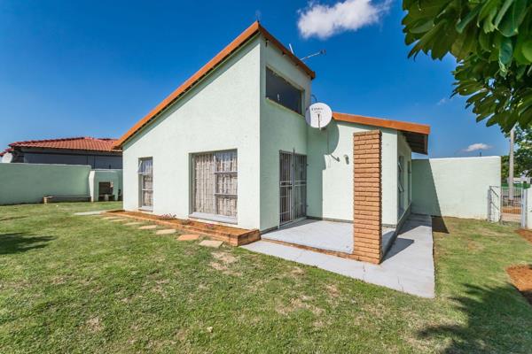 This home gives you a peaceful feeling as you enter the neat green garden. The kitchen ...