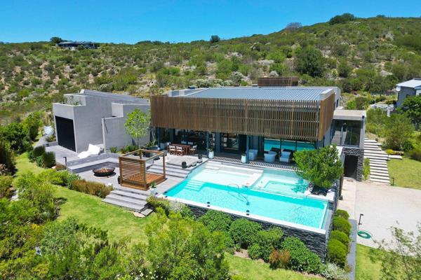 EXCLUSIVE MANDATE : Creative, Classy, Eclectic and Fun! This modern home is designed ...