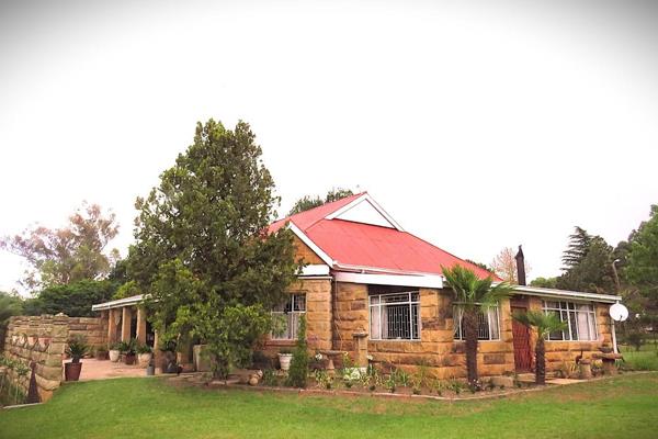 Nestled on the outskirts of town, this enchanting four-bedroom sandstone home effortlessly blends old-world charm with modern comfort. ...