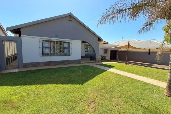 This delightful home  has been modernized with aluminium window and door frames. Tiled ...