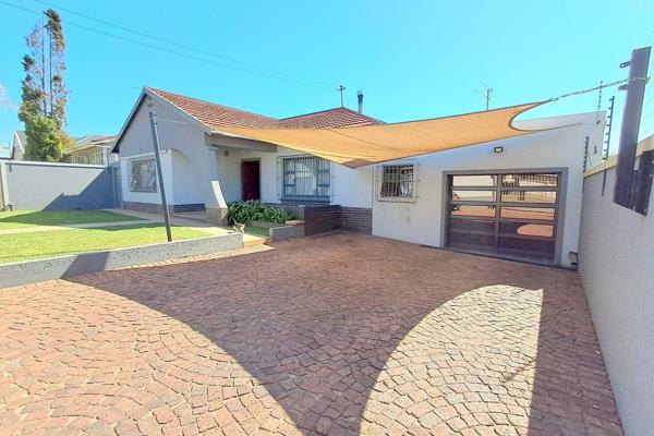 This delightful home  has been modernized with aluminium window and door frames. Tiled ...