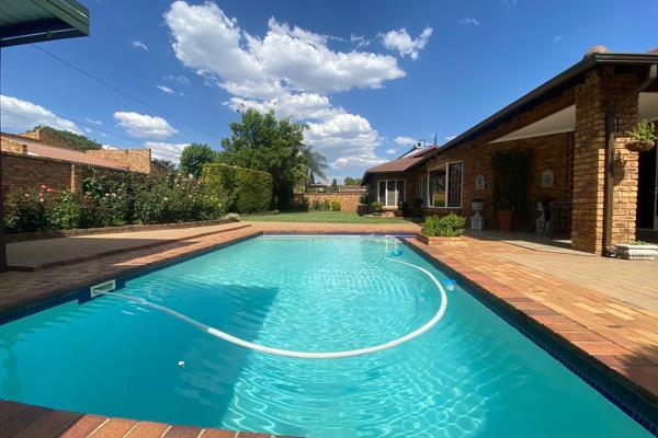 This beautifully maintained home in the secure East Village, Sunward Park, offers the ...