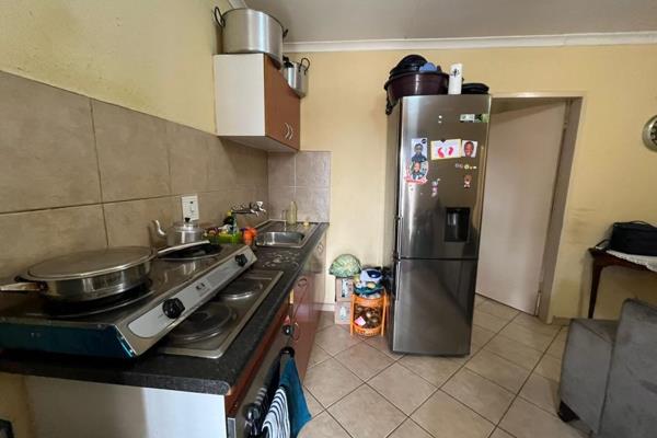 2 bedrooms and 1 bathroom townhouse situated in the heart of Olieven ext 36 in a secure ...