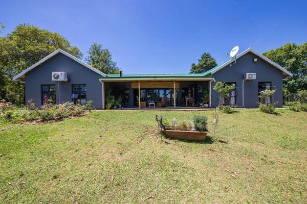 Options galore - lifestyle, farming, income earner? The choice is yours.

Nestled approximately 30 minutes from Howick along the Petrus Stroom Road lies this stunning property offering the unique combination of lifestyle and farming in a picturesque setting.
The main house ...