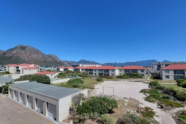 Experience the ultimate in coastal living with this airy, sun-drenched apartment offering breathtaking views from the False Bay belt to ...