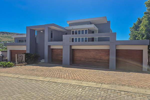 Step into this modern and spacious property in the prestigious Ruimsig Country Estate. This home offers a combination of modern ...