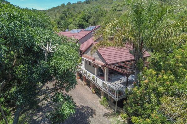 Discover serene living in this enchanting forest retreat, nestled at the end of a quiet ...