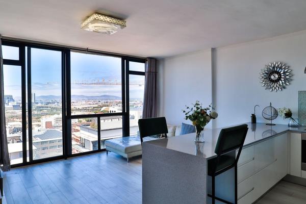 Located on the 16th floor, this exceptional one-bedroom apartment offers panoramic views of Cape Town&#39;s vibrant cityscape and ...