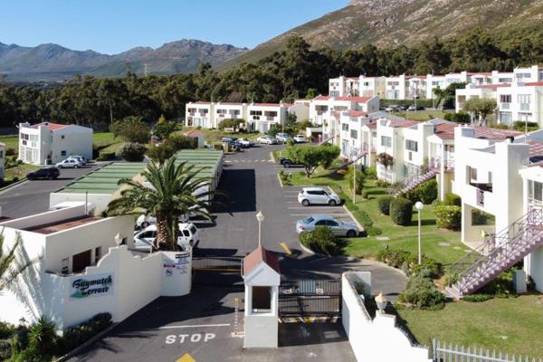 Welcome to your new home in the picturesque setting of Gordons Bay, where the mountains meet the sea. This cozy ground-floor apartment ...