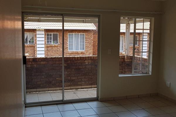 tiled, secure and neat
This unit offers - 
Open plan kitchen
lounge
2 bedrooms
1 ...