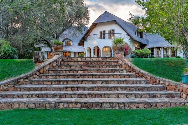 Exceptional accommodation, &#177;850m&#178; under roof, this expansive family home offers 5 large entertaining rooms, substantial ...