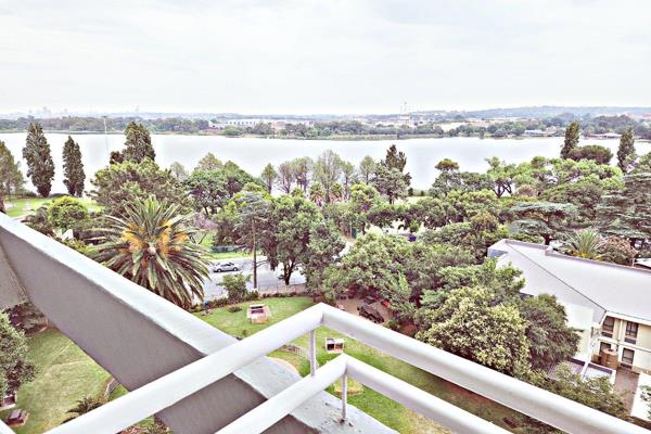 Experience the beauty of Germiston Lake from the comfort of this stylish 2-bedroom ...