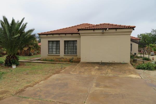 Secure, 4 Bedroom house for sale in Delareyville.   Conveniently situated within walking ...