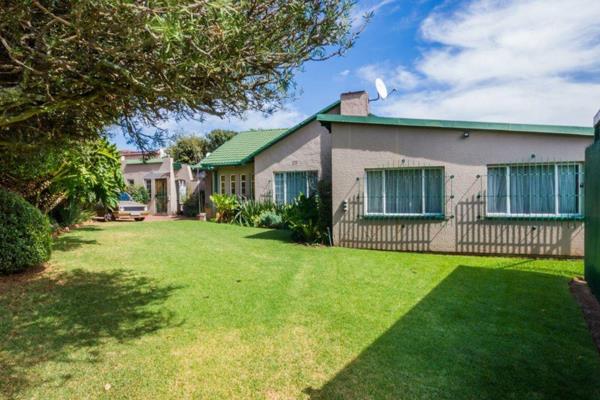 Well cared for home with lounge, dining room, enclosed patio with braai, dining and relaxing area, all with stack doors to ...