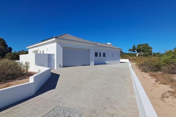 Experience the ultimate in modern living in this stunning 3-bedroom home, perfectly ...