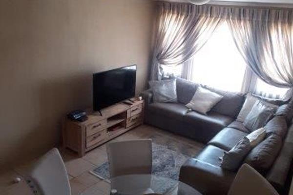 spacious unit 

2 bedrooms with built in cupboards
1 full bathroom shower bath basin and ...