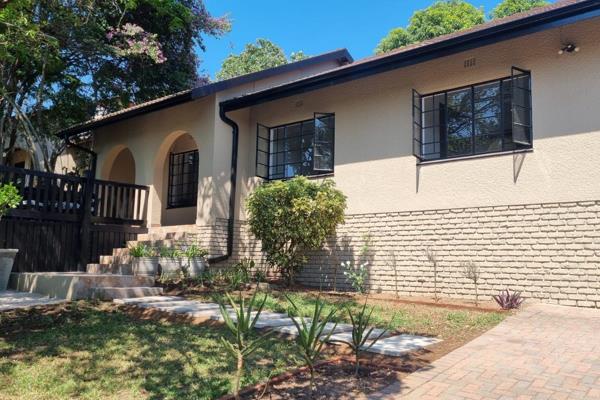 Welcome to your newly renovated oasis in West Acres! This stunning family home ...