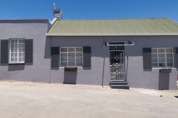 A cute and quaint Victorian cottage that boasts all the charms of modern living. Tiled ...