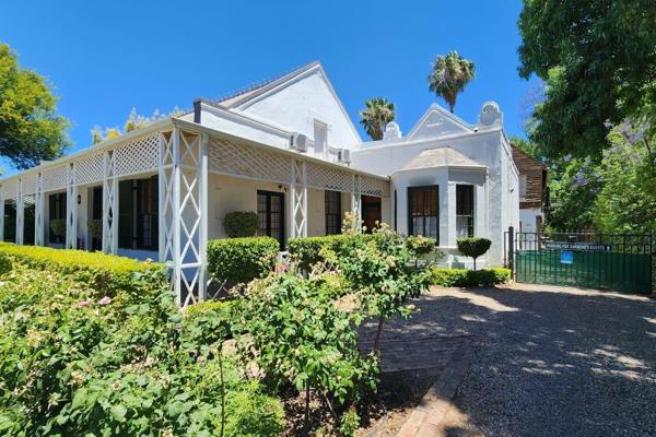 Built in 1853 by JH Mulder, this historic gem in Oudtshoorn blends timeless elegance with modern functionality.

The main house ...