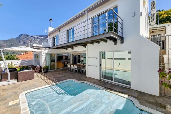 This beautiful family home is located on one of the most desirable roads in Tamboerskloof, offering an exceptional living experience ...