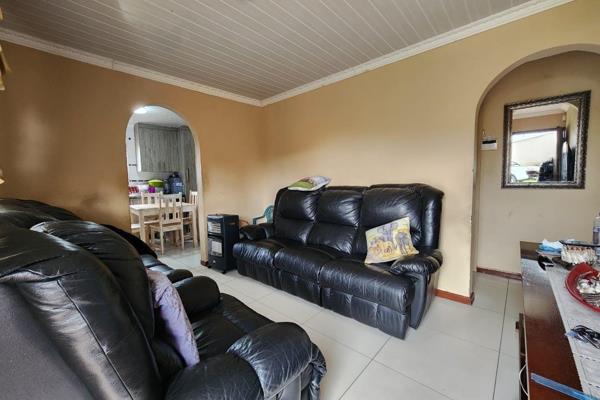 This property is situated on the Amalinda Main Road, offering easy access to transport routes.

The comfortable lounge flows seamlessly ...