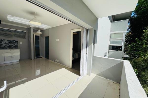 Unfurnished first floor apartment on Main Road Three Anchor Bay.
Open plan kitchen and lounge with stack up sliding doors and sunny ...