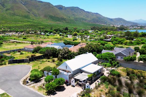 This exceptional home is designed to offer an unparalleled living experience, with sweeping views of the majestic Kleinrivier mountain ...