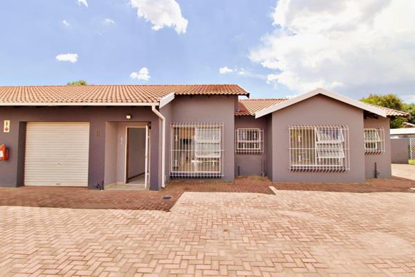 This lovely unit offers 113m2 of living space and further offers a private and sizeable back garden with built-in-braai area.  ...