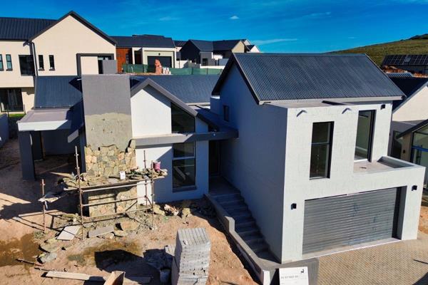 NO TRANSFER DUTIES

A stunning 4-bedroom home in Outeniquasbosch to be finished in December 2024, offering a blend of modern architecture and thoughtful design. As you enter, you&#39;re greeted by an open-plan living space that ...