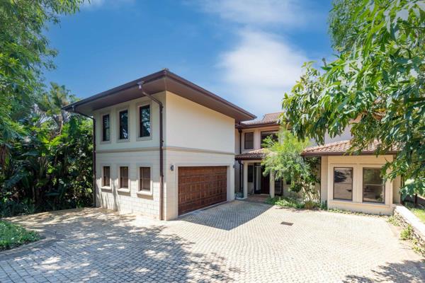 Private fairway front home with fantastic views in Zimbali. This large family home features a grand entrance with expansive ...