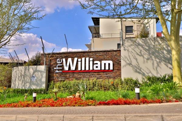 This contemporary 2-bedroom, 2-bathroom first-floor apartment at The William offers ...