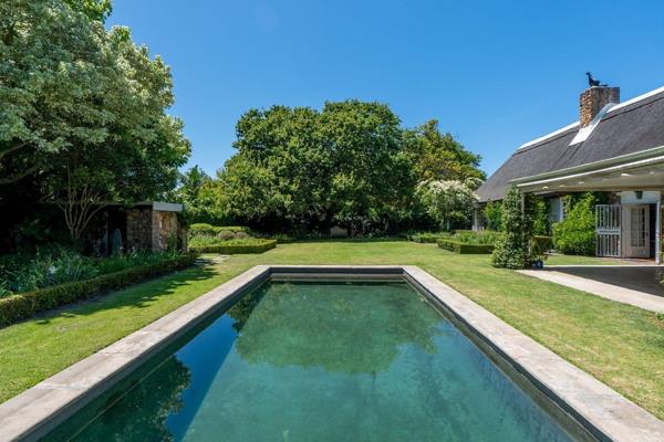 This Constantia family home is rich in history, built entirely from original Table Mountain sandstone—one of the few remaining examples ...