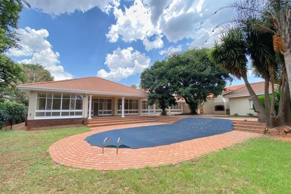 Welcome the growing family looking for a home offering expansive proportions and a tranquil environment. Nestled on a large stand ...