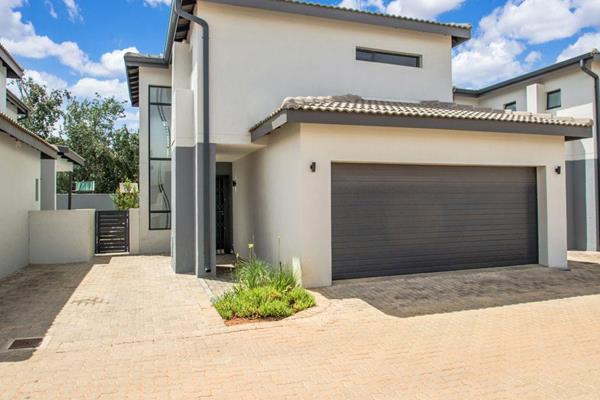 Nestled in the scenic neighborhood of Little Falls and overlooking the tranquil Kloofendal Nature Reserve, this modern freestanding ...