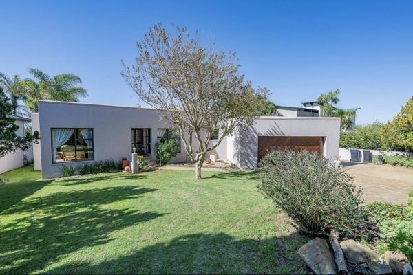 Step into this inviting residence through a spacious entrance area that immediately sets ...