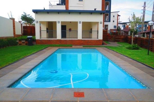 Comprising: 2 bedrooms, 2 bathrooms (m.e.s), Open plan kitchen and lounge leading onto ...