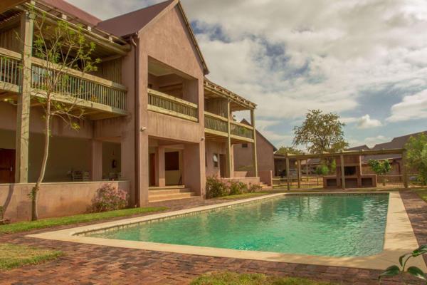 Well appointed three bedroom home in the ever popular The Village within Hoedspruit Wildlife Estate. The home is in a good position ...