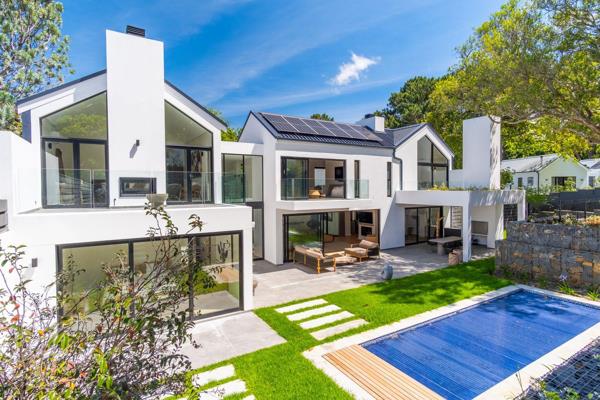 Indulge in the lavishness of this truly magnificent residence, situated in a small private estate! 
 
Ideally located in Constantia ...