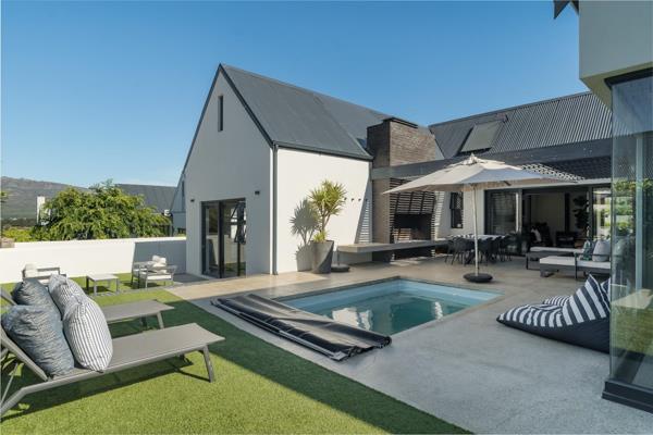 Discover the epitome of modern family living in the highly sought-after Uitgezorcht Estate, Paarl South. This north-facing gem offers ...