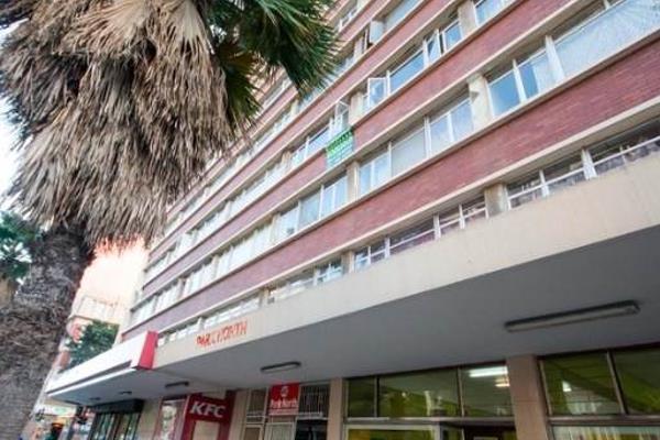 Spacious 2 Bedroom Flat situated within a secure building in the Durban CBD. The ...