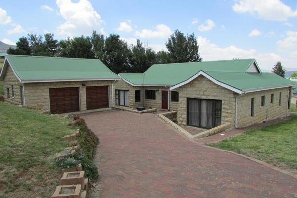 Fully equipped 4 bedroom 4 bathroom home on the popular Clarens Golf Estate is rented out as a Guest House when the owners are not ...