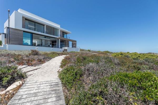 Pam Golding Properties  proudly presents  this magnificent beach front home with unsurpassed views .  Offering the epitome of luxury ...