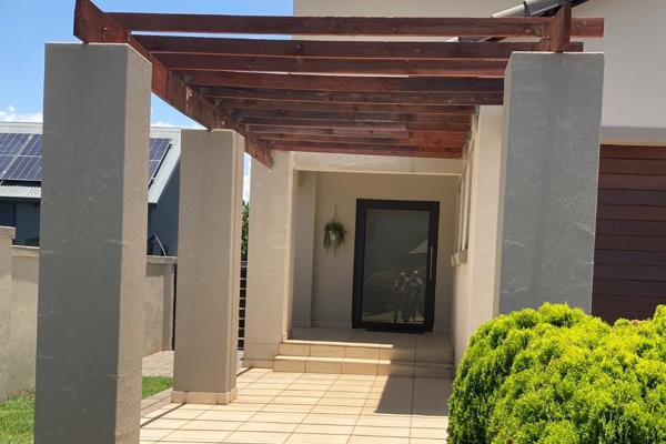 This 3 bedroom house features an indoor braai and study on the ground floor as well as a guest powder room. The kitchen has solid ...