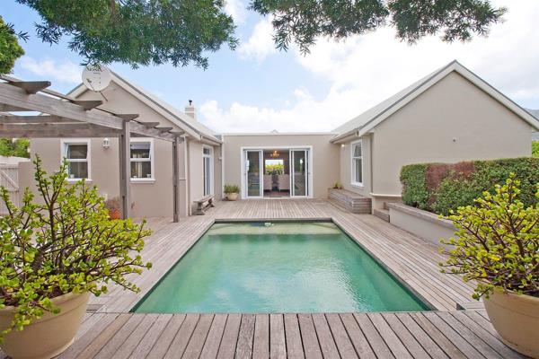 Situated in the sought-after Noordhaven neighborhood of Noordhoek, this beautiful ...