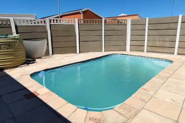 Upon entering the property, you are greeted with a sparkling blue pool, perfect for those warm and sunny days.

Open plan, bright and ...